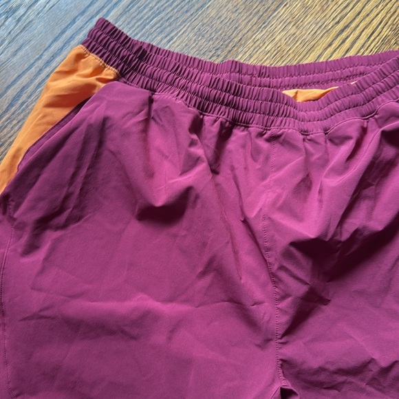 E Peloton burgundy/orange elastic drawstring waist technical fabric shorts. Med - Picture 2 of 5